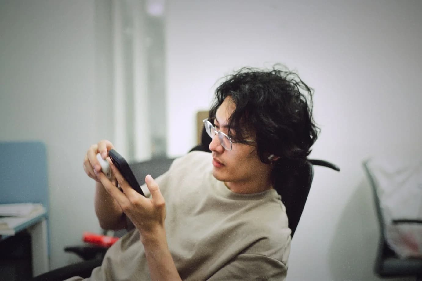 A beHired.AI teammate reviewing job applications on a phone